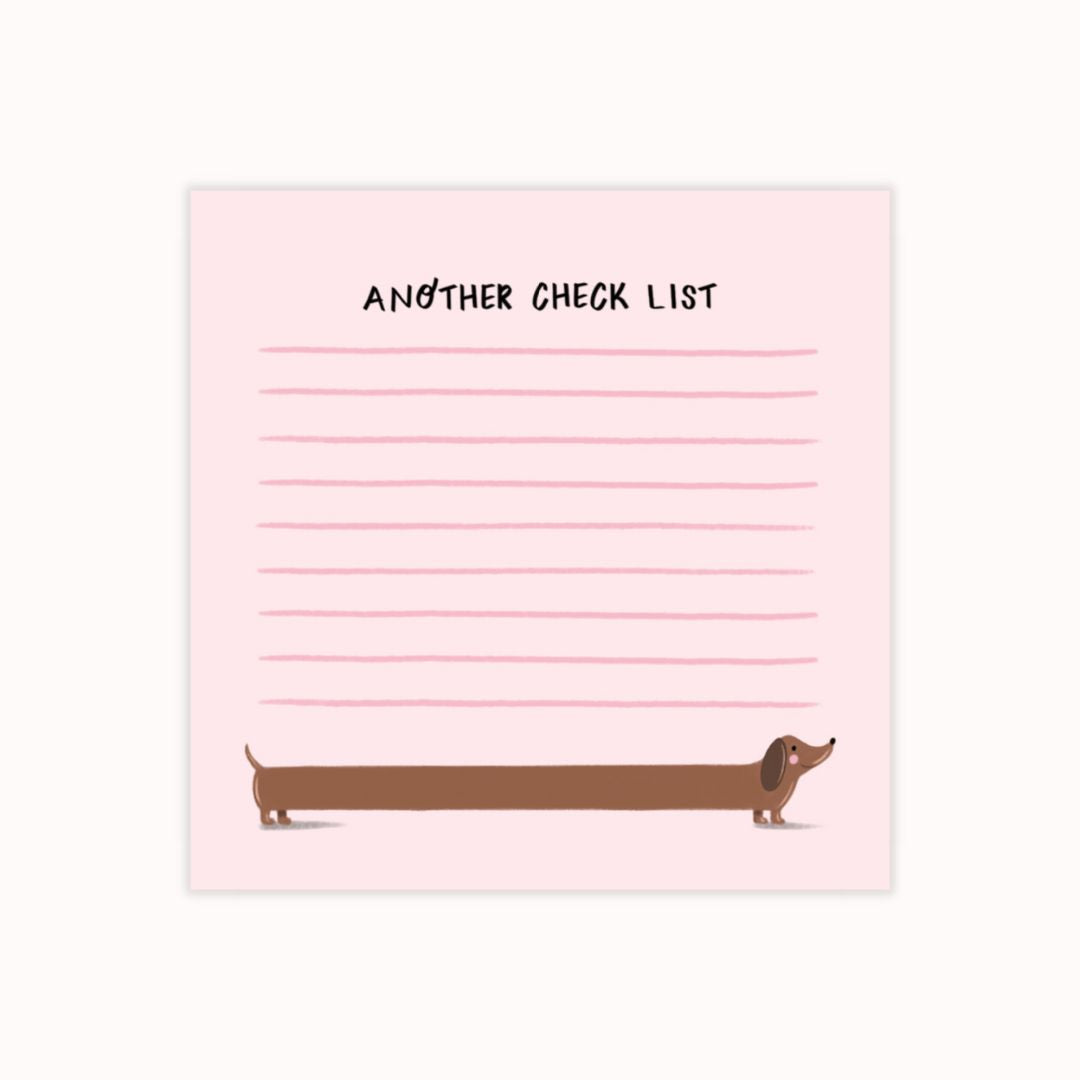 Hand-illustrated pink sticky notepad featuring a blushing dachshund and the label 'Another Check List'.